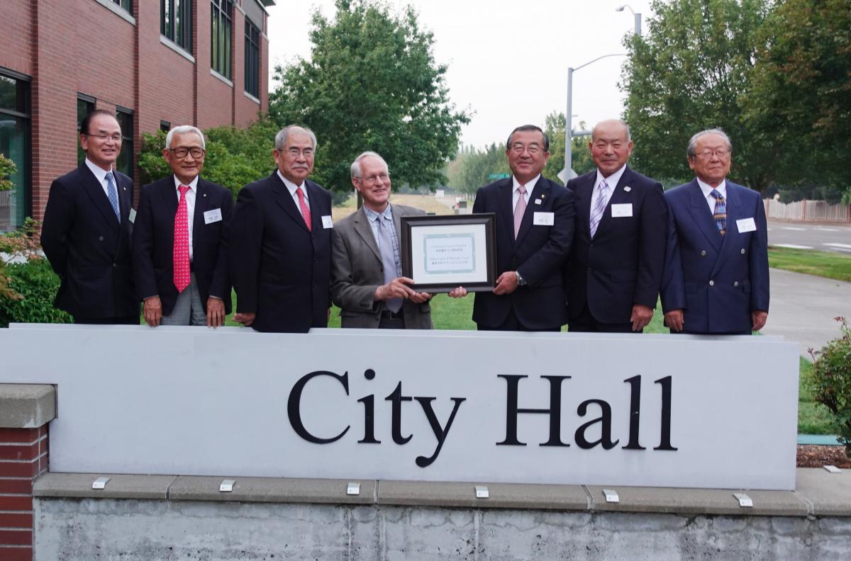 Wilsonville Mayor Tim Knapp (center) with six members of the Kitakata delegation at City Hall.
