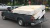 Pickup full of mattresses to be dumped